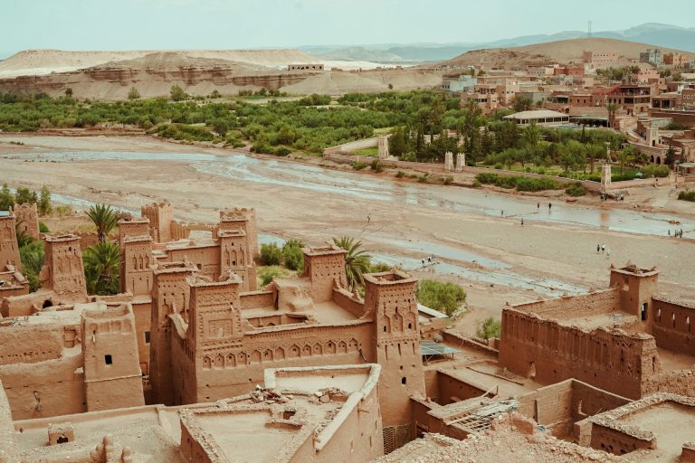 Traveller in a Moroccan médina checking maps on a phone running a local eSIM