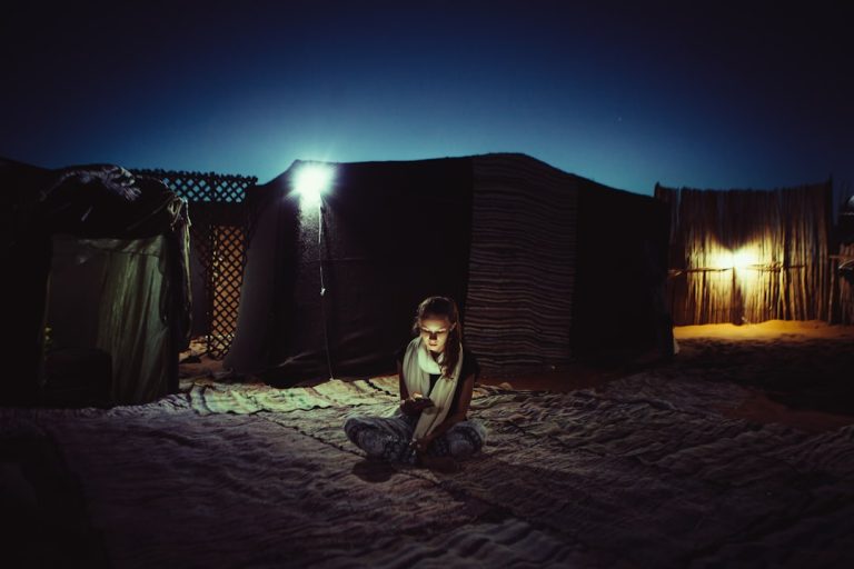 Traveller on the Atlantic coast checking maps on a phone connected via Moroccan eSIM